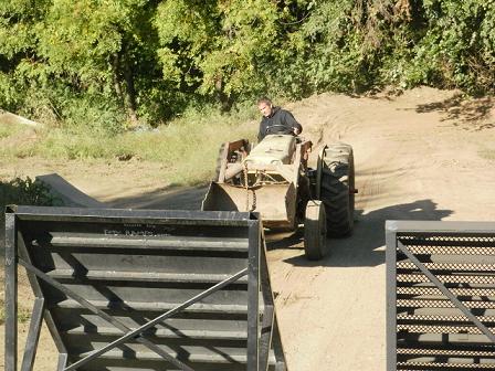 Manager Eric Tompkins preps the course before a long day.