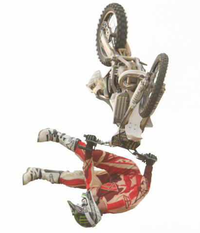 Greg Hartman pulls off a switchblade-backflip during a practice session.